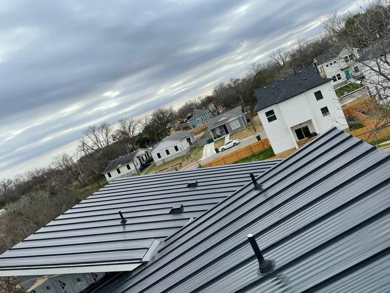 Standing seam metal roof panels with vents for Skylight Repair in Whitefish